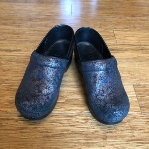 Dansko black with iridescent silver design.  W39